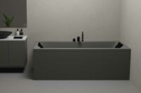 Nemo 190 grå matt badekar i grå omgivelser, svarte armaturer og servant. Lekkert rektangulært speil.
