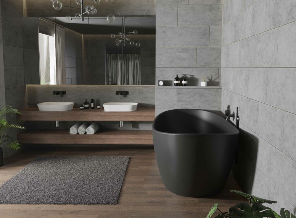 Viena frittstående badekar i svart matt med svart matt veggarmatur. Dobbel servant og stort speil. Gulvflis i treimitasjon og store flis på vegg i betongimitasjon
